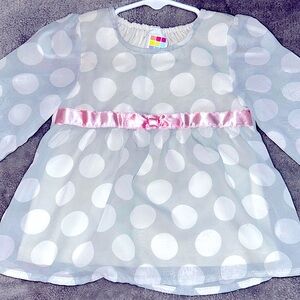 Adorable grey and white polka-dot flutter sleeved blouse with baby pink bow